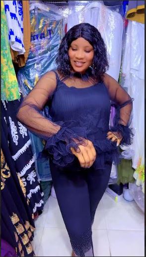 Sheer Elegance Peplum Top